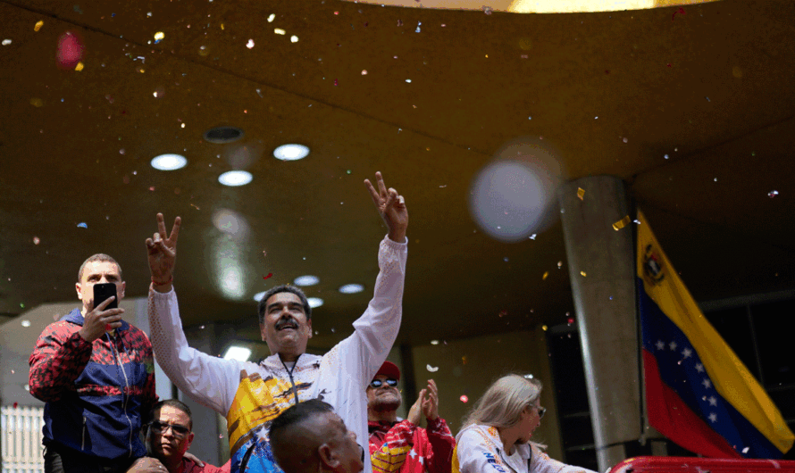 Maduro makes official re-election run while would-be rival struggles to register candidacy