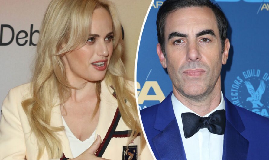 Rebel Wilson Doubles Down, Says She ‘Won’t Be Bullied’ By ‘A**hole’ Sacha Baron Cohen Over Memoir