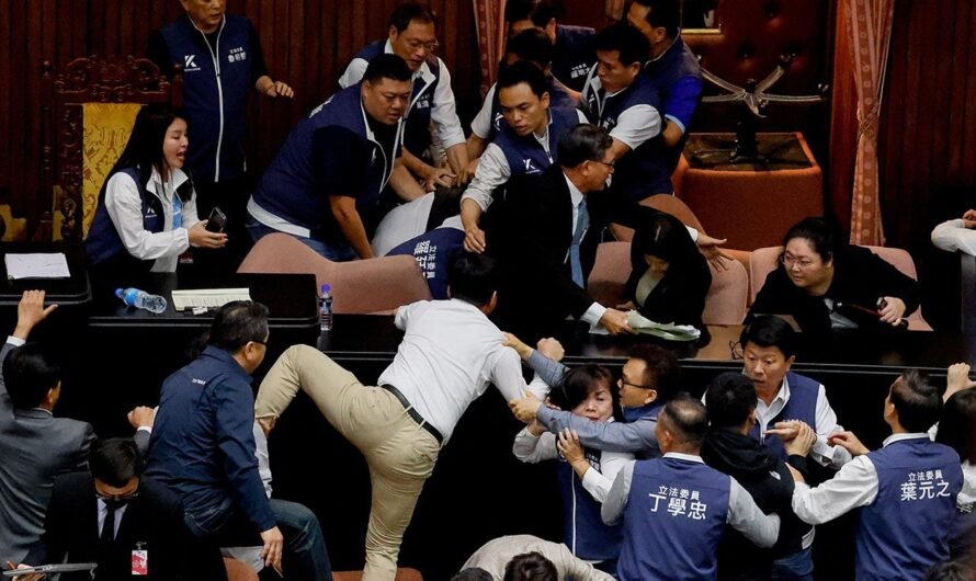 Taiwan lawmakers punch, shove each other over reforms