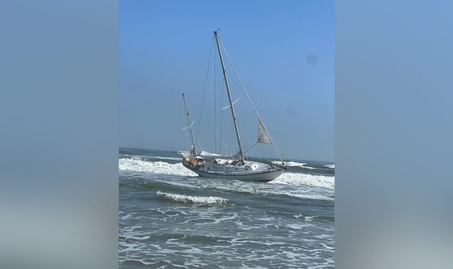 Pair rescued from disabled sailboat off popular beach