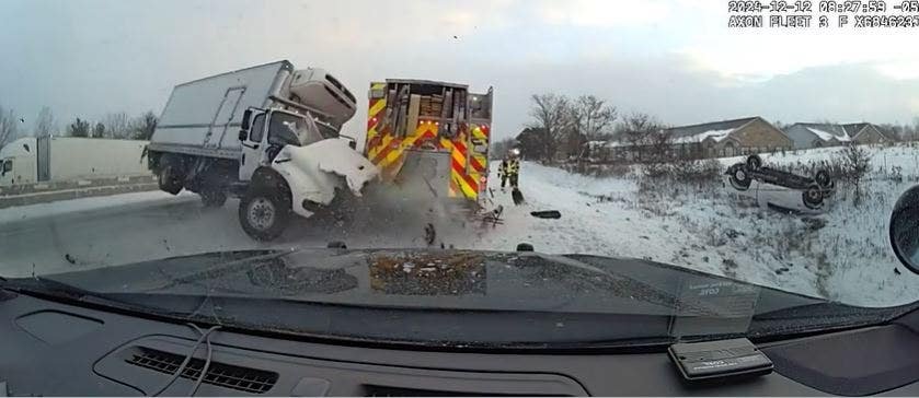 Dramatic video shows truck slam into first responder vehicles